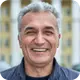 Marcos, gerente e aluno do curso de neurociência Córtex, sorrindo.